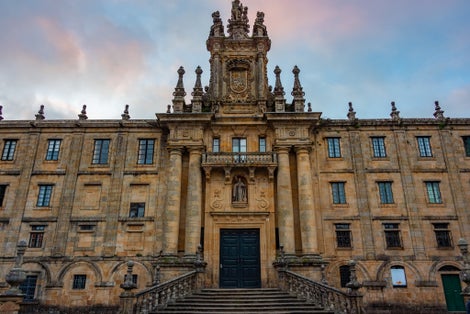 Photo of Night view of Mosteiro de San MartiГ±o Pinario at Santiago de Compostela in Spain.