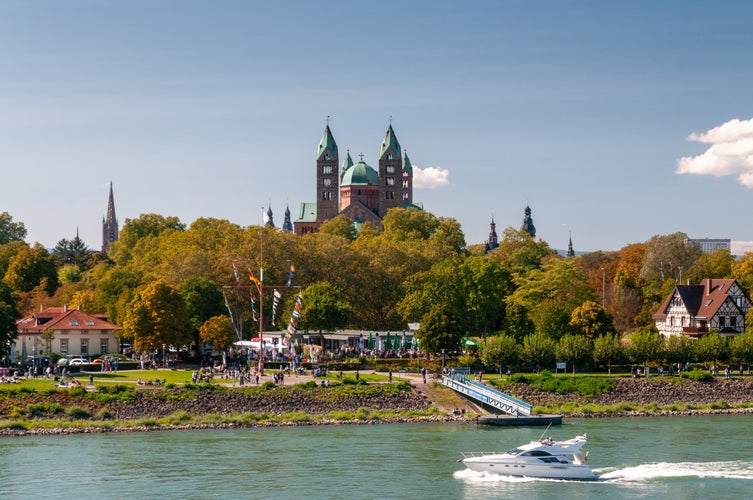 Photo of scenic view over the Rhine to the cathedral of Speyer, Germany.