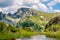 photo of view of Picturesque summer mountain landscape with a lake and an impressive peak in the background. One of the Urdini Lakes and Malyovitsa Peak in Rila Mountain, Bulgaria.,Kyustendil bulgaria.