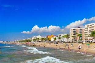 Photo of aerial view of coast at Calafell cityscape with modern apartment buildings, Spain.