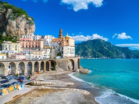 Photo of aerial morning view of Amalfi cityscape on coast line of Mediterranean sea, Italy.