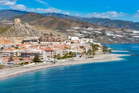 Photo of an aerial view of a mediterranean spanish beach (San Cristobal beach) at Almunecar, Granada, Spain.