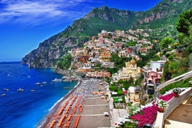 Photo of aerial morning view of Amalfi cityscape on coast line of Mediterranean sea, Italy.