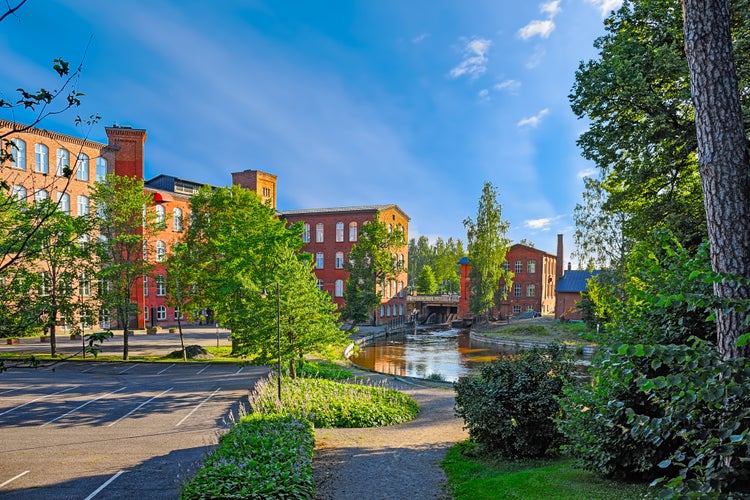 Photo of red brick buildings of former cotton spinning mill in Forssa, Finland.