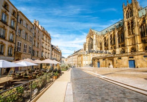 Photo of Metz city view of Petit Saulcy an Temple Neuf and Moselle River in Summer, France.