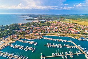 Photo of aerial view to the town of Porec in Istria, Croatia on Adriatic coast.