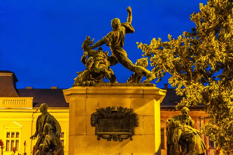 photo of view of View on the historic statue of Nyiregyhaza, Hungary, Europe on at night.