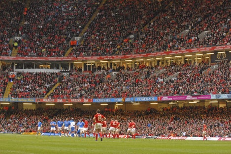 ugby fans gathering at the Millennium stadium for the Six Nations rugby match Wales vs Italy, in Cardiff.