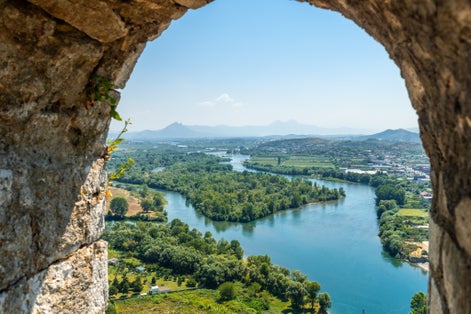 Photo looking at the lake from the arch of the Rozafa Castle wall in the city Shkoder. Albania.