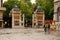 Photo of entrance door to Antwerp Koningin Astridplein. Pelican and statue eagle in bronze above the towers, Belgium.