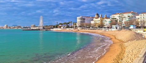 Photo of beautiful aerial view of Saint-Tropez, France with seascape and blue sky.