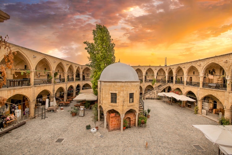 photo of Historical Great Inn, Nicosia, North Cyprus. Ancient Ottoman architecture and arch building, Nicosia, Cyprus.