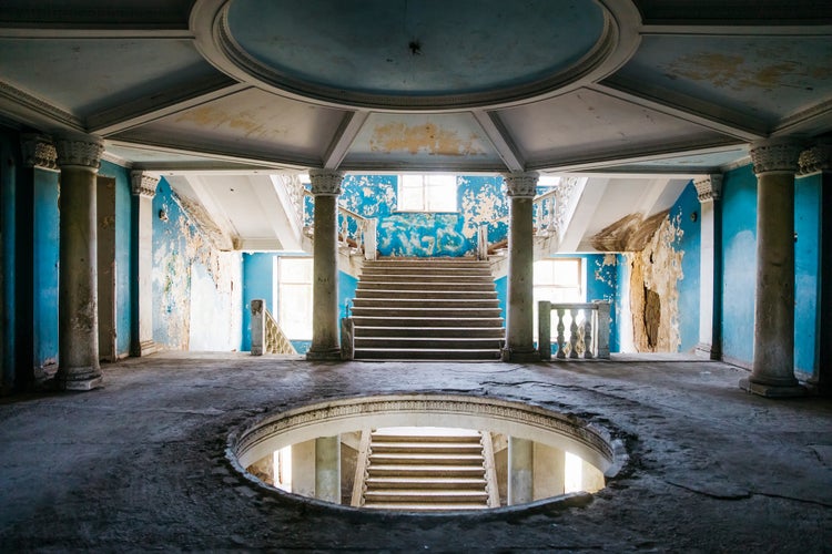 photo of view of TSKALTUBO, GEORGIA - APRIL 27, 2019: Detail of the abandoned Soviet Sanatorium Iveria in Tskaltubo, Georgia.