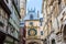 photo of Clock in the Rue du Gros-Horloge in Rouen on a beautiful summer day, France.