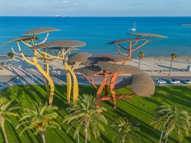 Photo of aerial view of beach and cityscape Salou, Spain.