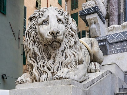 photo of view of the Lion on left of entrance stairs, Genoa, Italy.