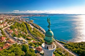 Photo of Trieste lighthouse Phare de la Victoire and cityscape panoramic aerial view, Friuli Venezia Giulia region of Italy.