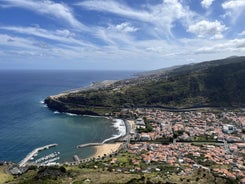 Photo of beach aerial view of Machico bay and Cristiano Ronaldo International airport in Madeira, Portugal.