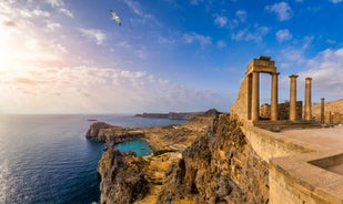 Photo of panoramic aerial view of Lindos bay, village and Acropolis, Rhodes, Greece.