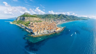 Photo of view of Cefalu and Promontorio de Torre Caldura seen from Norman Castle, La Rocca park, Italy.