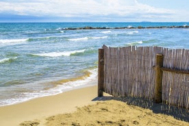 Photo of Umbrellas and sunbeds in San Felice Circeo, Italy.