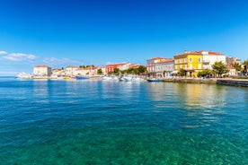 Photo of aerial view of town of Rovinj historic peninsula , famous tourist destination in Istria region of Croatia.