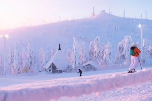 photo of beautiful view of Finnish landscape with trees in snow, ruka, karelia, lapland, hilly winter landscapes in famous winter sports area called Ruka.