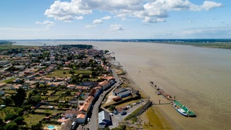 Photo of aerial view of the famous Saint Nazaire bridge over la Loire river in Loire Atlantique, France.