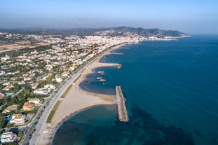 Photo of Sand beach and historical Old Town in mediterranean resort Sitges near Barcelona, Costa Dorada, Catalonia, Spain.