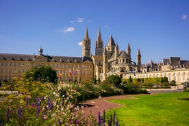 Photo of Vannes, beautiful city in Brittany, boats in the harbor, with typical houses and the cathedral in background, France.