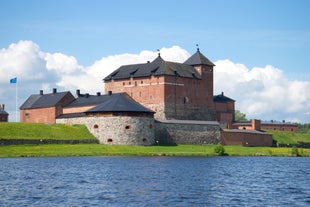 Early autumn morning panorama of the Port of Turku, Finland, with Turku Castle at background.