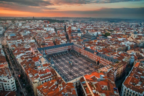 Photo of Madrid plaza Mayor aerial view with historical buildings in Spain.