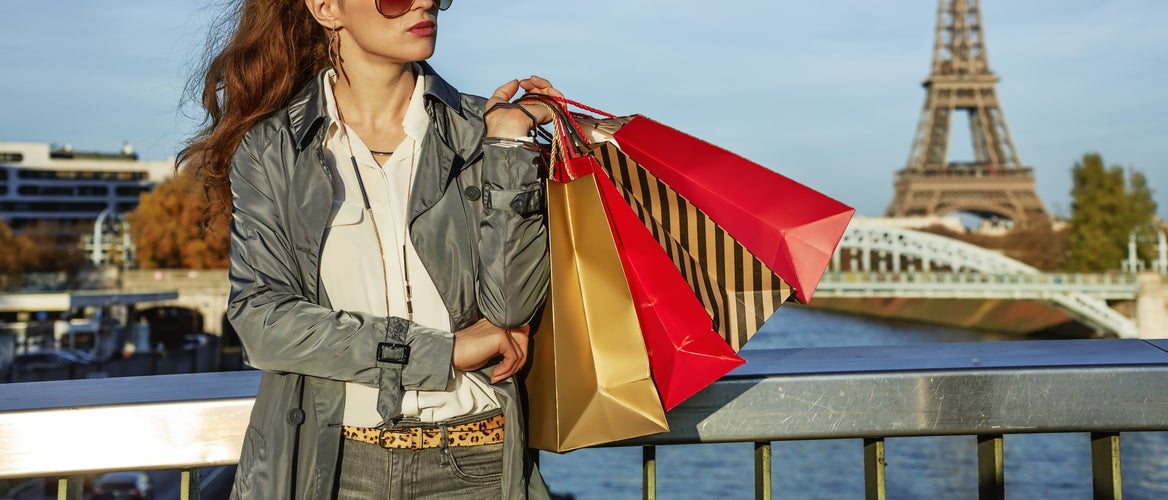 Paris autumn sales. young fashion-monger with shopping bags.jpg