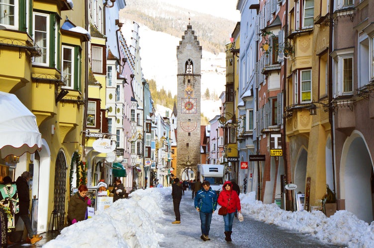 Zwölferturm tower in main street of the old medieval town of Vipiteno \ Sterzing, South Tyrol, Italy.