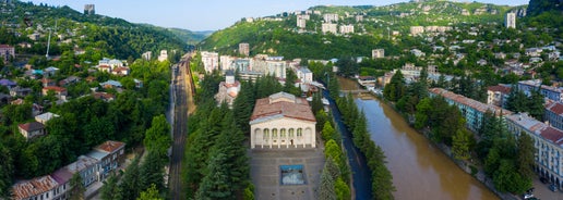 Photo of aerial view of the mining town Chiatura famous for its manganese mines being situated on Kvirila river, Typical soviet architecture, Georgia.