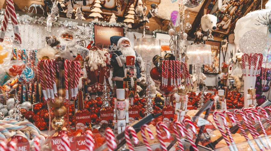 Colorful candy and Christmas decorations at a festive market stall in Switzerland..jpg