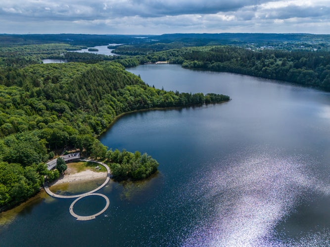 Elevated perspective of Vestre Søbad, Silkeborg, Denmark. A harmonious blend of modern architecture and natural beauty, the lakeside retreat offers a serene escape nestled in the heart of Jutland.