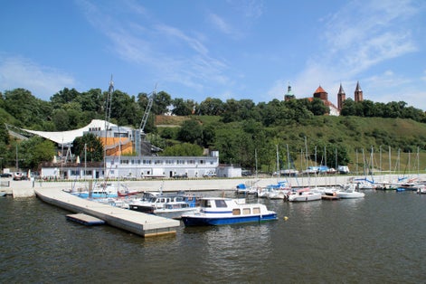 A view of the marina and the Tumskie Hill in Płock (Poland) from the side of the Vistula River.