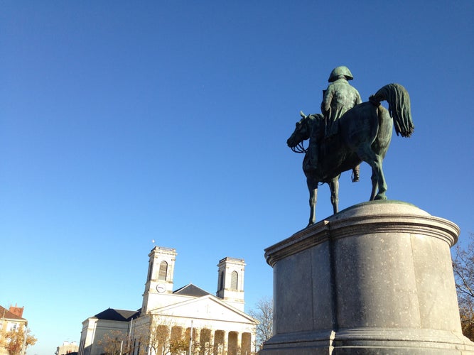 Photo of la Roche-sur-Yon park in Vendee in France with statue and monument.