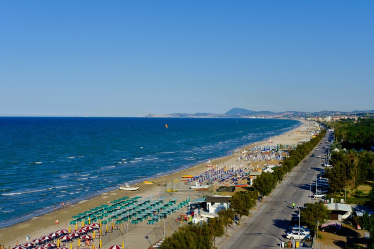 Senigallia Beach. View under umbrellas and main beach.