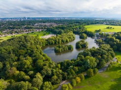 Aerial drone view of Manchester city in UK on a beautiful sunny day.