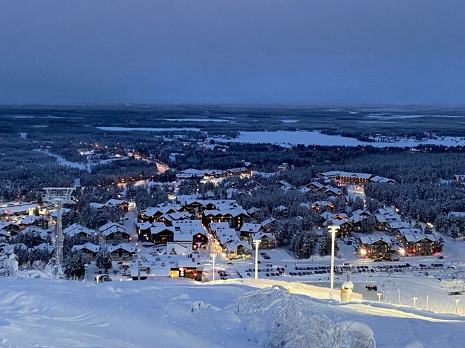 View of the town of Sirkka from Levi fell in Lapland, Finland. Main ski slope is to the right, and the cable supports for the gondola are visible to the left.