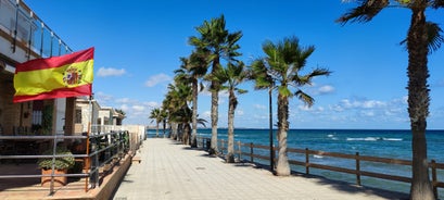 Photo of Beach seashore with wooden path to sea water in San Pedro del Pinatar