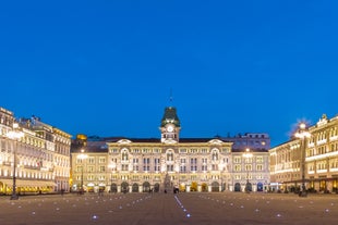 Photo of Trieste lighthouse Phare de la Victoire and cityscape panoramic aerial view, Friuli Venezia Giulia region of Italy.