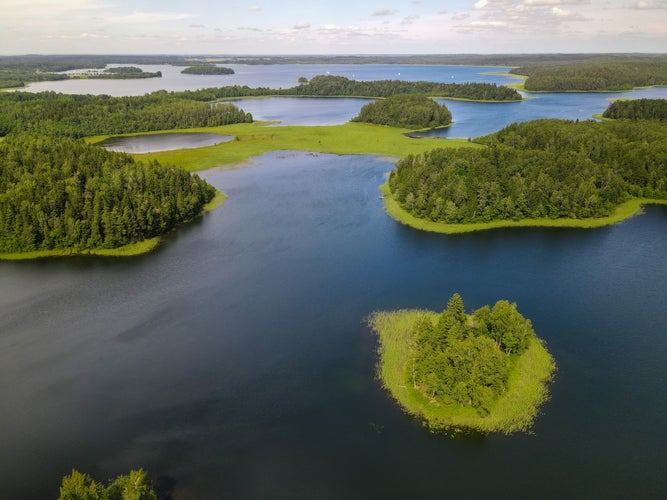  Aerial view of lake with islands in Lithuania, Plateliai lake in Samogitia National Park.