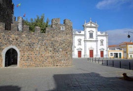 Photo of Baroque facade of Queluz National Palace and Neptune Fountain in Sintra, Lisbon district, Portugal.