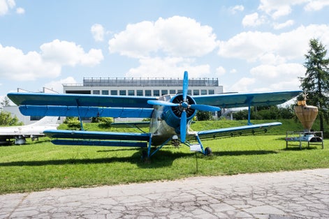 blue plane with propeller in Aviation Museum exhibition in Krakow