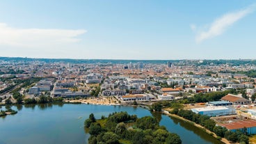 Photo of Metz city view of Petit Saulcy an Temple Neuf and Moselle River in Summer, France.