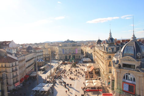 photo of beautiful aerial view over Comedy square and the three graces fountain in Montpellier, France.