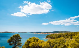 Photo of aerial view of Brodarica village near Sibenik beach and coastline, Dalmatia region of Croatia.